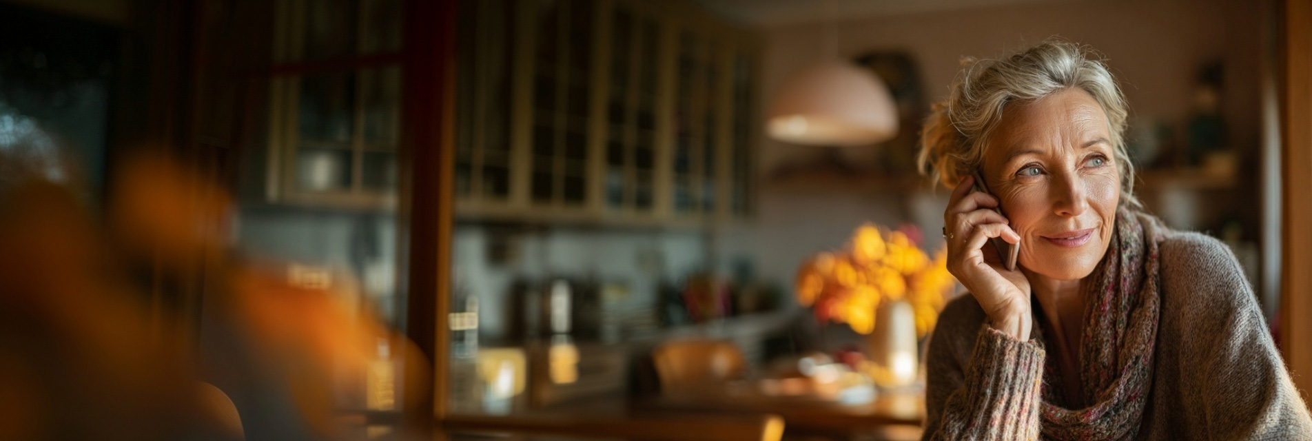 A person making a call to contact us